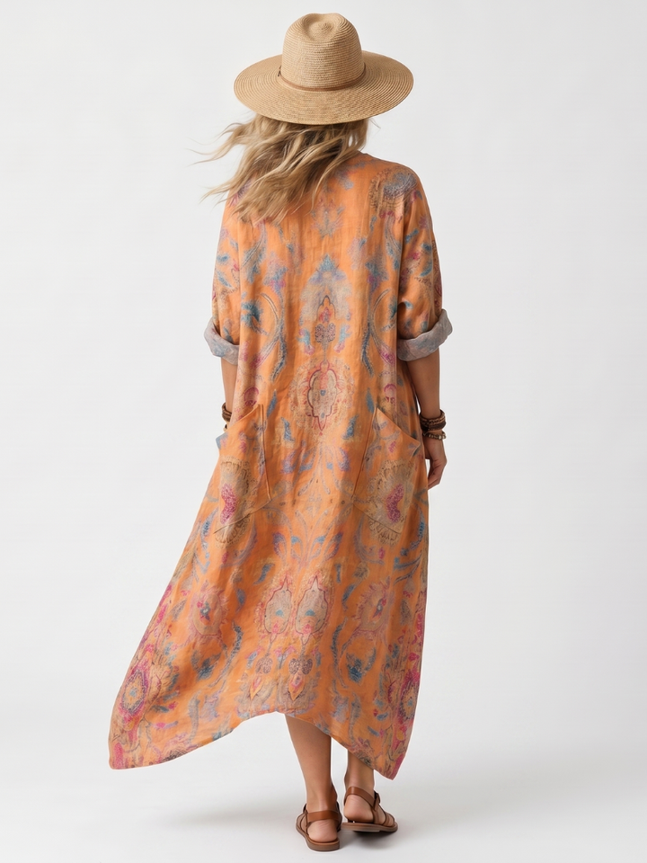 Remi | Vestido Midi Oversized con Cuello Notch y Bolsillos Impresos